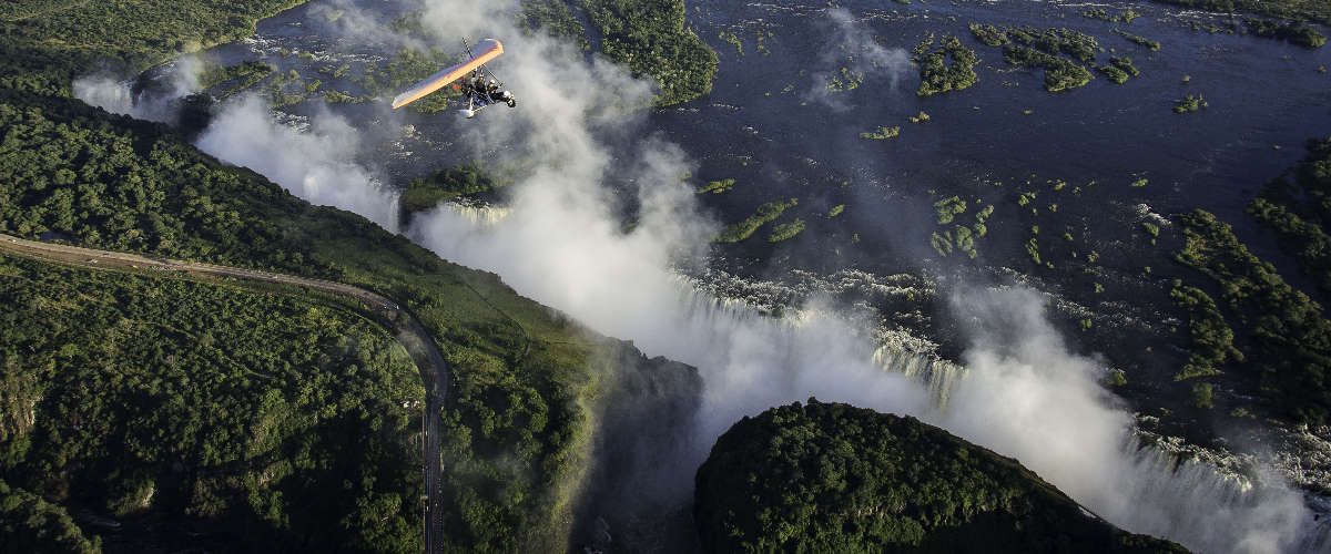 scenic microlight trip over a misty, 'smoke that thunders' Victoria Falls